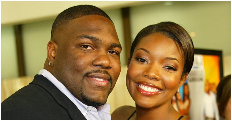 (l-r): Chrisas Howardas ir jo buvusi žmona Gabrielle Union šypsosi juodais drabužiais.