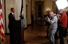 Reporteros gráficos de Reuters y AP describen la puesta en escena de la foto de Obama