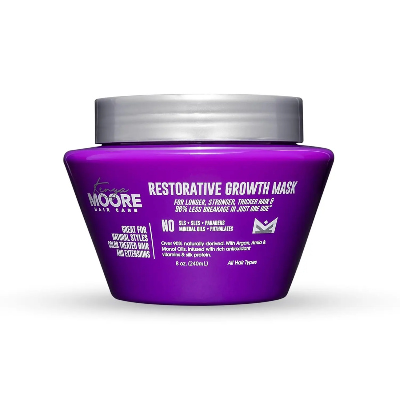 Un frasco morado de Kenya Moore Hair Care's Restorative Growth Mask