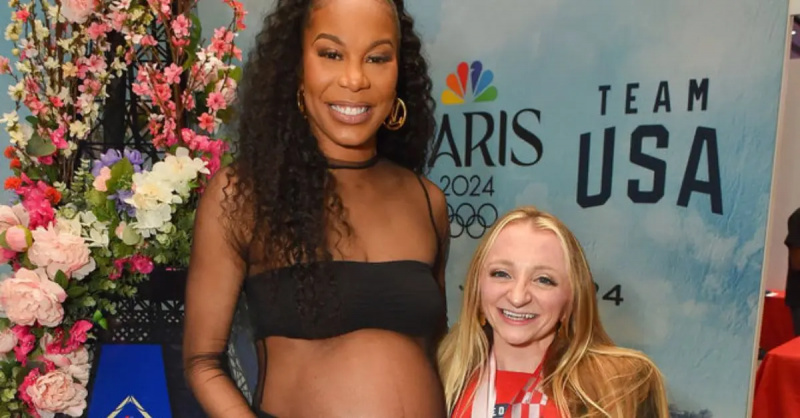 Sanya Richards Ross i obožavatelj poziraju za fotografiju na BravoConu